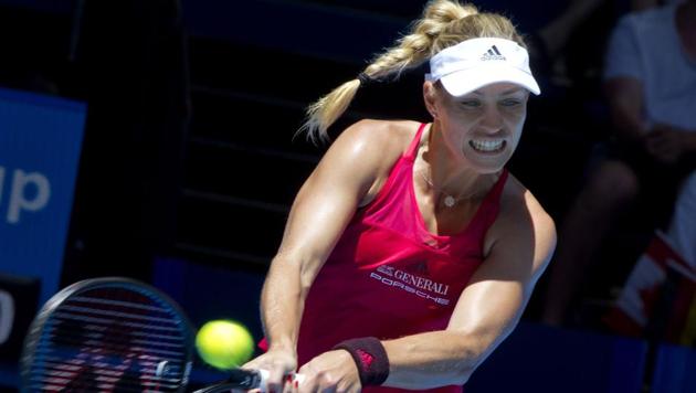 Angelique Kerber returns against Eugenie Bouchard during their seventh session women's singles match on day five of the Hopman Cup tennis tournament in Perth on January 3, 2018. (AFP) Angelique Kerber returns against Eugenie Bouchard during their seventh session women's singles match on day five of the Hopman Cup tennis tournament in Perth on January 3, 2018. (AFP)