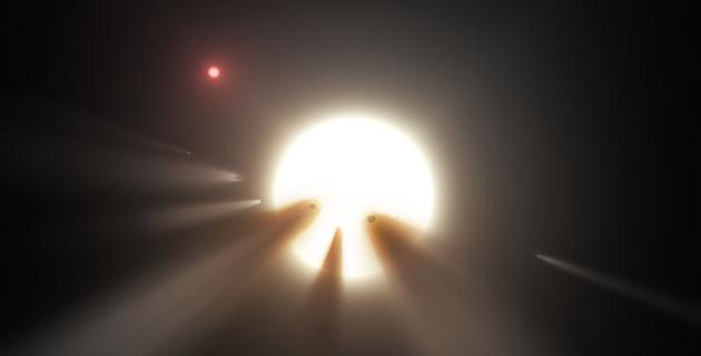 NASA image obtained January 3, 2018 shows an illustration of a star behind a shattered comet. Observations of the star KIC 8462852 by NASA’s Kepler and Spitzer space telescopes suggest that its unusual light signals are likely from comet fragments.(AFP)
