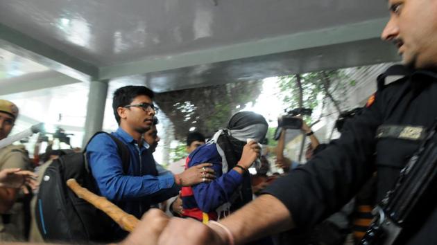 CBI officials take the 16-year-old accused in the Ryan International School murder case to court soon after his arrest in November. (Parveen Kumar/HT File) CBI officials take the 16-year-old accused in the Ryan International School murder case to court soon after his arrest in November. (Parveen Kumar/HT File)