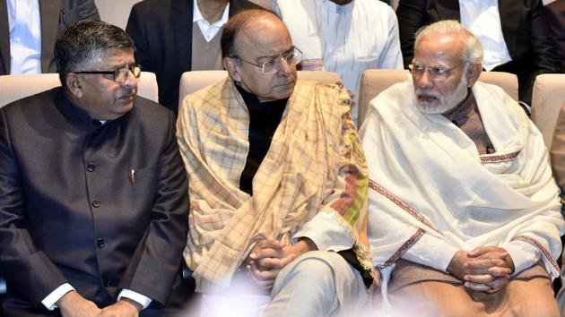 PM Narendra Modi (R), Union Minister holding Law and Justice and Electronics and Information Technology Ravi Shankar Prasad (L) along with Union Finance Minister and Minister of Corporate Affairs Arun Jaitley, during the BJP Parliamentary Party Meeting in New Delhi on Wednesday. The triple talaq bill has been tabled in the Rajya Sabha with the opposition parties, including Congress creating a ruckus in the House while Arun Jaitley today accused the Congress of “double standards”. (Sonu Mehta / HT Photo)