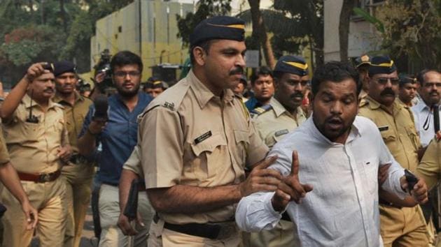 Sachin Bansode, Mumbai president of Chhatra Bharati is taken into police custody at Vile Parel, Mumbai. Police denied activist-legislator Jignesh Mewani permission to address students at Vile Parle on Thursday, a day after Mumbai bandh. Authorities detained the organisers of the proposed rally and imposed Section 144 of the IPC to prevent assembly at the spot. (Satyabrata Tripathy / HT Photo)
