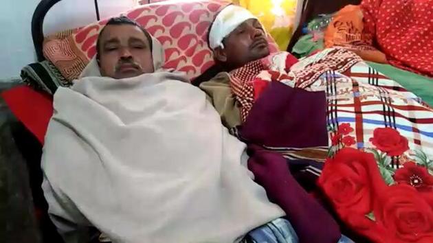 Two of the injured in Malda Medical College and Hospital on Wednesday. (HT Photo) Two of the injured in Malda Medical College and Hospital on Wednesday. (HT Photo)