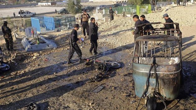 Afghan security forces inspect the site of a deadly bombing in Jalalabad province, east of Kabul, Afghanistan, Dec. 31, 2017. (AP) Afghan security forces inspect the site of a deadly bombing in Jalalabad province, east of Kabul, Afghanistan, Dec. 31, 2017. (AP)