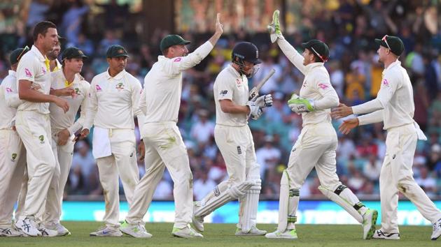 The Australian cricket team celebrates after dismissing England batsman Jonny Bairstow on the first day of the fifth Ashes Test in Sydney on Thursday. (AFP) The Australian cricket team celebrates after dismissing England batsman Jonny Bairstow on the first day of the fifth Ashes Test in Sydney on Thursday. (AFP)