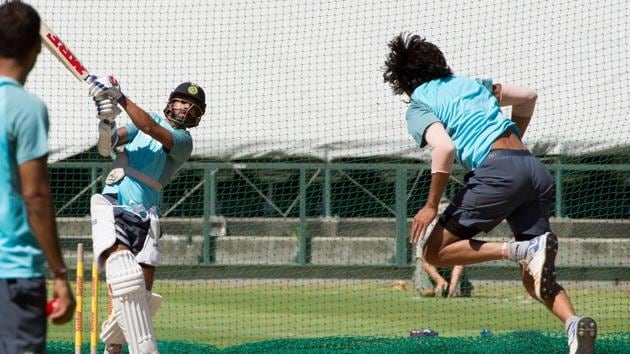 Indian cricket team’s Ishant Sharma bowls to Shikhar Dhawan (left) during a nets session ahead of the first Test against South Africa cricket team at Newlands Stadium in Cape Town. (AFP) Indian cricket team’s Ishant Sharma bowls to Shikhar Dhawan (left) during a nets session ahead of the first Test against South Africa cricket team at Newlands Stadium in Cape Town. (AFP)
