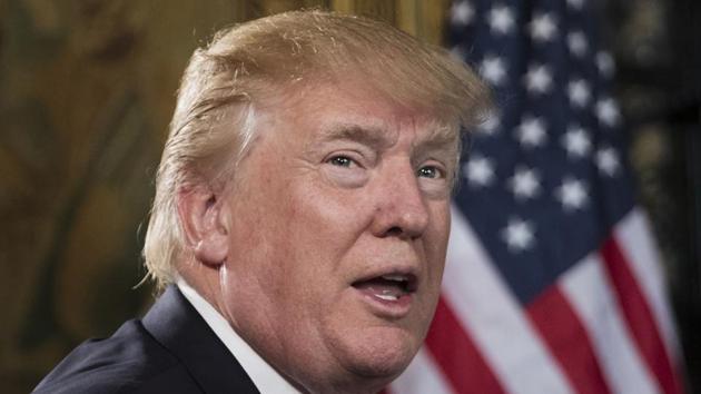 President Donald Trump turns to talk to the gathered media during a Christmas Eve video teleconference with members of the military at his Mar-a-Lago estate in Palm Beach, Fla. (AP File Photo) President Donald Trump turns to talk to the gathered media during a Christmas Eve video teleconference with members of the military at his Mar-a-Lago estate in Palm Beach, Fla. (AP File Photo)