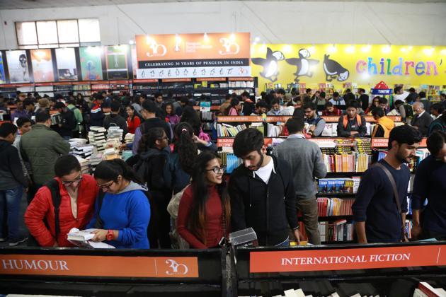 Visitors browse titles at the New Delhi World Book Fair 2017, held at Pragati Maidan.(AMAL KS / HT PHOTO)