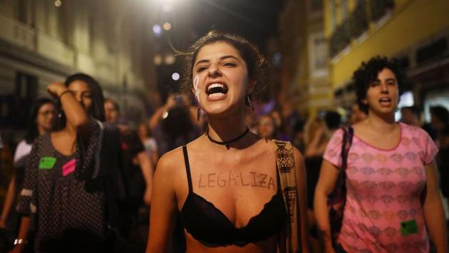 Women’s activists march for pro-choice rights on September 28, 2017 in Rio de Janeiro. More than 170 women, including prominent actresses, directors and academics, have signed a manifesto declaring publicly that they had abortions. Thousands have also taken to the streets to protest attempts to further restrict abortion, and more than 34,000 have signed petitions sent to Congress. (Mario Tama / Getty Images)