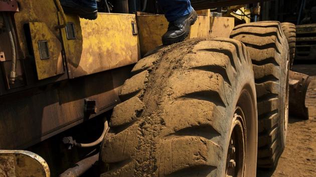 In 1950s, US companies zeroed in on its vast resources, pouring money into factories turning iron ore to steel and bauxite for aluminium as well as rails and river ports for shipping it to market. Today, a massive dump truck that loads ore onto trains to be sent to the foundries --a lynchpin in the cycle-- runs on a tire so badly worn that strips of rubber tread are missing. (Rodrigo Abd / AP) 