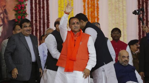 Vijay Rupani waves before taking the oath of Gujarat chief minister during a swearing in ceremony in Gandhinagar. (AP File Photo) Vijay Rupani waves before taking the oath of Gujarat chief minister during a swearing in ceremony in Gandhinagar. (AP File Photo)