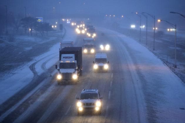 Commuters travel on the southbound side of the New Jersey Turnpike during a snowstorm in Woodbridge, New Jersey. Several states in the US are reeling from a winter storm called ‘bombogenesis’. (AP) Commuters travel on the southbound side of the New Jersey Turnpike during a snowstorm in Woodbridge, New Jersey. Several states in the US are reeling from a winter storm called ‘bombogenesis’. (AP)