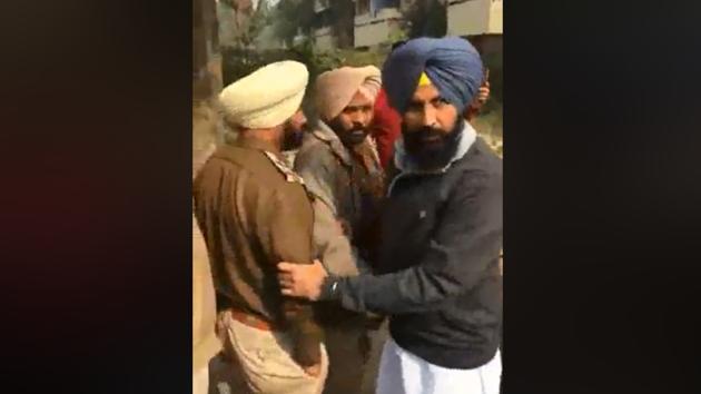 Lok Insaaf Party MLA Simarjeet Singh Bains went live on Facebook as he apprehended two policemen of the anti-power-theft wing. (Facebook grab) Lok Insaaf Party MLA Simarjeet Singh Bains went live on Facebook as he apprehended two policemen of the anti-power-theft wing. (Facebook grab)