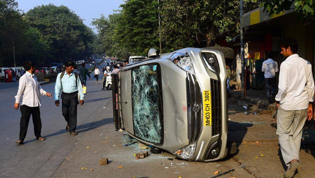 Protesters vandalised vehicles at Vikhroli on Wednesday. (HT) Protesters vandalised vehicles at Vikhroli on Wednesday. (HT)