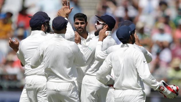 Indian bowler Bhuvneshwar Kumar (C) picked up all three South African wickets in the morning session of Day 1 of the first Test at Newlands on Friday. (AFP) Indian bowler Bhuvneshwar Kumar (C) picked up all three South African wickets in the morning session of Day 1 of the first Test at Newlands on Friday. (AFP)