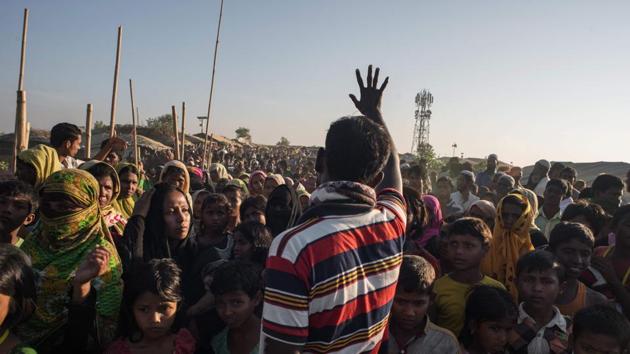 This file photo taken shows a man gesturing and telling Rohingya migrants queuing to receive aid that the delivery has been cancelled, at the Kutupalong refugee camp at Cox's Bazar in Bangladesh. (AFP file) This file photo taken shows a man gesturing and telling Rohingya migrants queuing to receive aid that the delivery has been cancelled, at the Kutupalong refugee camp at Cox's Bazar in Bangladesh. (AFP file)