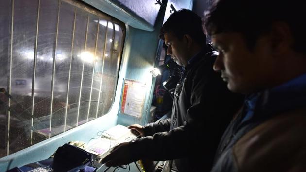 A locomotive driver demonstrates the use of the Fog Safe device on January 4, 2018. “On clear days, we run the trains at the sanctioned speed, which is around 100 kmph. When it is foggy, we do not go over 30-35 kmph,” said the pilot, illustrating how trains run at almost less than half their regular speeds, causing delays. (Sanchit Khanna / HT Photo) A locomotive driver demonstrates the use of the Fog Safe device on January 4, 2018. “On clear days, we run the trains at the sanctioned speed, which is around 100 kmph. When it is foggy, we do not go over 30-35 kmph,” said the pilot, illustrating how trains run at almost less than half their regular speeds, causing delays. (Sanchit Khanna / HT Photo)