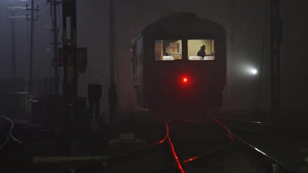 A blanket of dense fog enveloped Delhi on Thursday, delaying flight and train services. Although all trains of the Northern Railways are now equipped with a GPS-based Fogsafe device, which alerts locomotive pilots of upcoming landmarks, signal crossings and stations 500m in advance, a major dent in weather related delays, reschedules and cancellations is still awaited. (Sanchit Khanna / HT Photo) A blanket of dense fog enveloped Delhi on Thursday, delaying flight and train services. Although all trains of the Northern Railways are now equipped with a GPS-based Fogsafe device, which alerts locomotive pilots of upcoming landmarks, signal crossings and stations 500m in advance, a major dent in weather related delays, reschedules and cancellations is still awaited. (Sanchit Khanna / HT Photo)