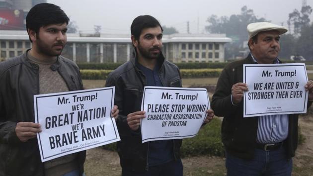 Pakistani activists of civil society protest against US President Donald Trump in Lahore.(AP Photo)