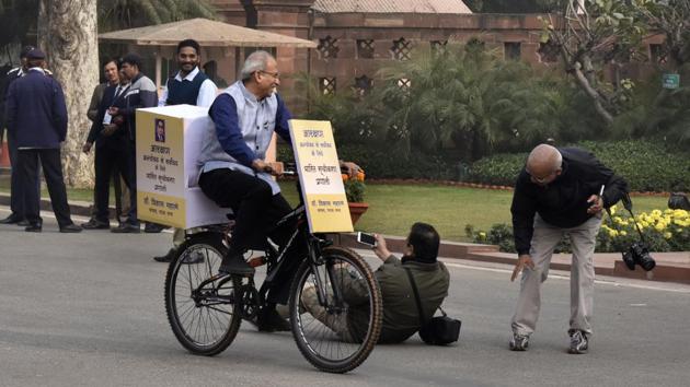 Member of Parliament of Rajya Sabha Dr. Vikas Mahatme rides a bicycle inside the Parliament premises to mark his protest against reservation during the winter session in January. (Sonu Mehta / HT Photo) Member of Parliament of Rajya Sabha Dr. Vikas Mahatme rides a bicycle inside the Parliament premises to mark his protest against reservation during the winter session in January. (Sonu Mehta / HT Photo)