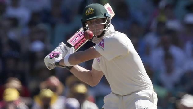 Australia's Steve Smith plays a high ball during the second day of their fifth Ashes Test against England in Sydney on Friday. (AP) Australia's Steve Smith plays a high ball during the second day of their fifth Ashes Test against England in Sydney on Friday. (AP)