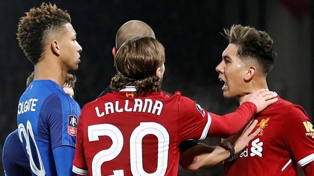 Liverpool's Roberto Firmino and Everton's Mason Holgate were involved in an ugly spat during the Merseyside derby on Friday. (Action Images via Reuters) Liverpool's Roberto Firmino and Everton's Mason Holgate were involved in an ugly spat during the Merseyside derby on Friday. (Action Images via Reuters)