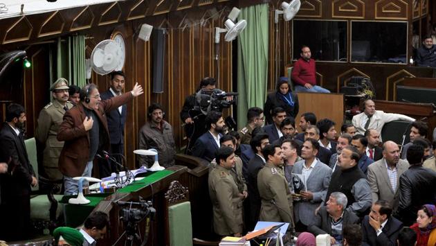 National Conference and Congress MLA's protest inside the J&K Legislative assembly during the budget session, in Jammu. (Nitin Kanotra / HT Photo) National Conference and Congress MLA's protest inside the J&K Legislative assembly during the budget session, in Jammu. (Nitin Kanotra / HT Photo)