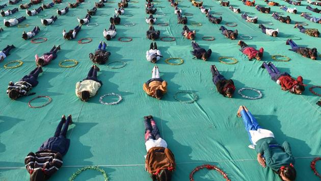 Schoolchildren take part in a yoga routine during a rehearsal ahead of the International Kite Festival 2018 in Ahmedabad. (Sam Panthaky / AFP) Schoolchildren take part in a yoga routine during a rehearsal ahead of the International Kite Festival 2018 in Ahmedabad. (Sam Panthaky / AFP)