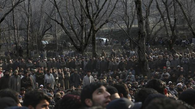 Kashmiri villagers attend the funeral of rebel Fardeen Ahamed at Hyuna village 45 Kilometers (28 miles) south of Srinagar. (AP) Kashmiri villagers attend the funeral of rebel Fardeen Ahamed at Hyuna village 45 Kilometers (28 miles) south of Srinagar. (AP)