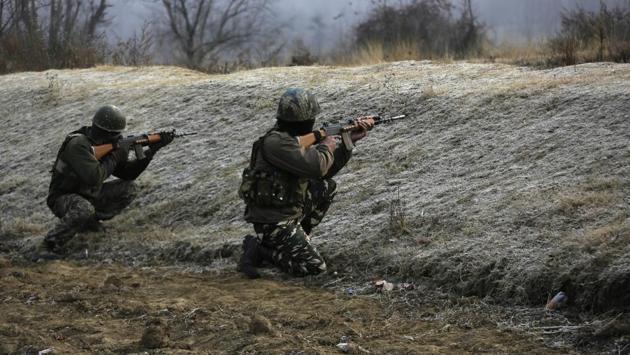 Indian paramilitary force soldiers take position at the site where suspected rebels stormed a paramilitary camp at southern Lethpora village in Indian controlled Kashmir. A number of Indian soldiers and suspected militants were killed Sunday after rebels stormed a paramilitary camp in disputed Kashmir, officials said. (Mukhtar Khan / AP) Indian paramilitary force soldiers take position at the site where suspected rebels stormed a paramilitary camp at southern Lethpora village in Indian controlled Kashmir. A number of Indian soldiers and suspected militants were killed Sunday after rebels stormed a paramilitary camp in disputed Kashmir, officials said. (Mukhtar Khan / AP)