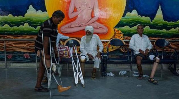 A man practices walking with a rubber-based prosthetic leg at the Bhagwan Mahaveer Viklang Sahayata Samiti non-profit organisation's main branch in Jaipur. (AFP File Photo) A man practices walking with a rubber-based prosthetic leg at the Bhagwan Mahaveer Viklang Sahayata Samiti non-profit organisation's main branch in Jaipur. (AFP File Photo)
