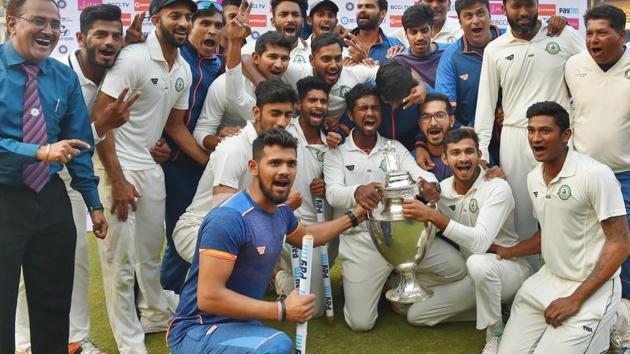 Vidarbha players after winning the Ranji Trophy final cricket match against Delhi by 9 wickets, in Indore on Monday. (Vijay Verma / PTI) Vidarbha players after winning the Ranji Trophy final cricket match against Delhi by 9 wickets, in Indore on Monday. (Vijay Verma / PTI)