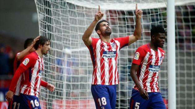 Atletico Madrid's Diego Costa celebrates a goal during a La Liga match vs Getafe CF at the Wanda Metropolitano Stadium in Madrid on Saturday. (AFP) Atletico Madrid's Diego Costa celebrates a goal during a La Liga match vs Getafe CF at the Wanda Metropolitano Stadium in Madrid on Saturday. (AFP)