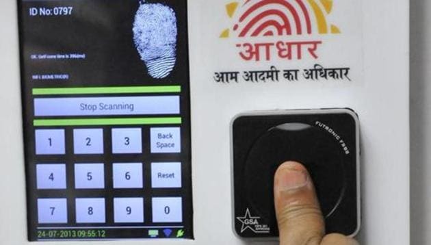 Employees mark their attendance through Aadhaar-based biometric system at the Planning Commission. (HT File Photo) Employees mark their attendance through Aadhaar-based biometric system at the Planning Commission. (HT File Photo)