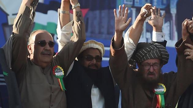 (From right) Difa-e-Pakistan Council’s Maulana Sami ul Haq, JuD chief Hafiz Saeed, Palestinian ambassador to Pakistan Walid Abu Ali during an anti-US and anti-Israel rally in Rawalpindi on December 29, 2017. (AFP) (From right) Difa-e-Pakistan Council’s Maulana Sami ul Haq, JuD chief Hafiz Saeed, Palestinian ambassador to Pakistan Walid Abu Ali during an anti-US and anti-Israel rally in Rawalpindi on December 29, 2017. (AFP)