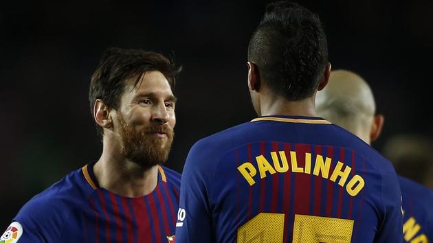Lionel Messi (L) scored as Barcelona defeated Levante 3-0 in La Liga on Sunday. (AP) Lionel Messi (L) scored as Barcelona defeated Levante 3-0 in La Liga on Sunday. (AP)