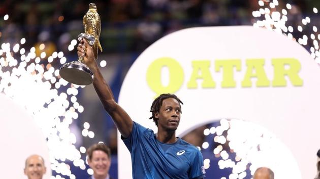 Gael Monfils of France with the Qatar Open tennis tournament after beating Russia's Andrey Rublev in the final in Doha. (AFP) Gael Monfils of France with the Qatar Open tennis tournament after beating Russia's Andrey Rublev in the final in Doha. (AFP)