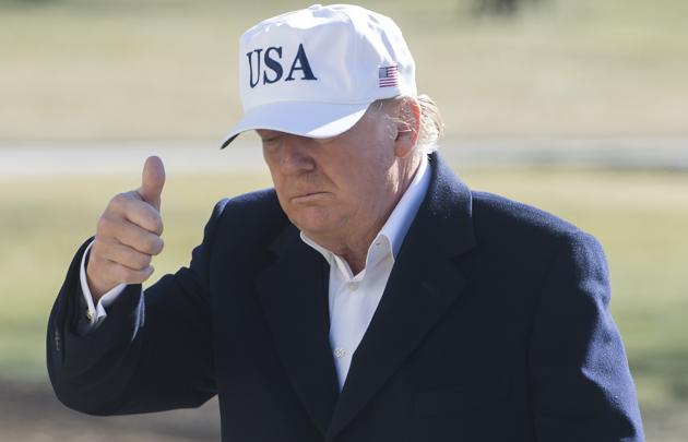 US President Donald Trump gives a thumbs-up as he walks from Marine One upon arrival on the South Lawn of the White House on January 7, 2018. (AFP) US President Donald Trump gives a thumbs-up as he walks from Marine One upon arrival on the South Lawn of the White House on January 7, 2018. (AFP)