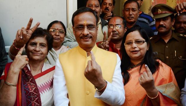 Deputy Chief Minister Dinesh Sharma with his wife right) and BJP mayor candidate Sanyukta Bhatia (left) after casting their votes for civic polls in Lucknow on November 26, 2017. (PTI File Photo) Deputy Chief Minister Dinesh Sharma with his wife right) and BJP mayor candidate Sanyukta Bhatia (left) after casting their votes for civic polls in Lucknow on November 26, 2017. (PTI File Photo)