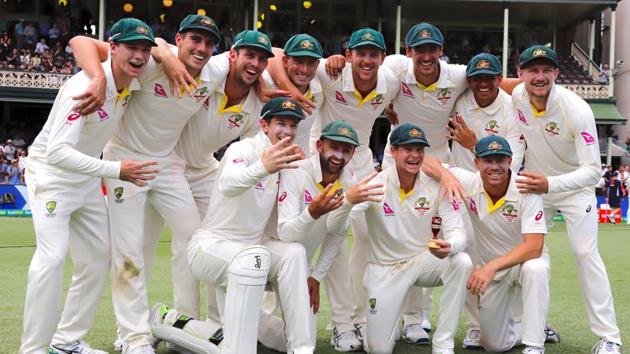 Australia's captain Steve Smith holds a replica Ashes urn next to team mates after they won the fifth Ashes Test match and the series 4-0. (REUTERS)