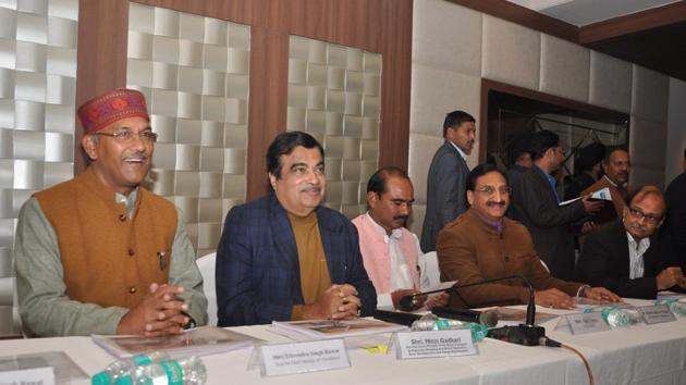 Union road transport minister Nitin Gadkari (second from left) and chief minister TS Rawat (left) during a function in the state capital. (Vinay S Kumar /HT) Union road transport minister Nitin Gadkari (second from left) and chief minister TS Rawat (left) during a function in the state capital. (Vinay S Kumar /HT)