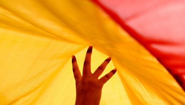 A rainbow flag is carried by Indian members and supporters of the lesbian, gay, bisexual, transgender (LGBT) community during a pride parade in New Delhi on November 12, 2017. Hundreds of members of the LGBT community marched through the Indian capital for the 10th annual Delhi Queer Pride Parade. (Sajjad Hussain / AFP)