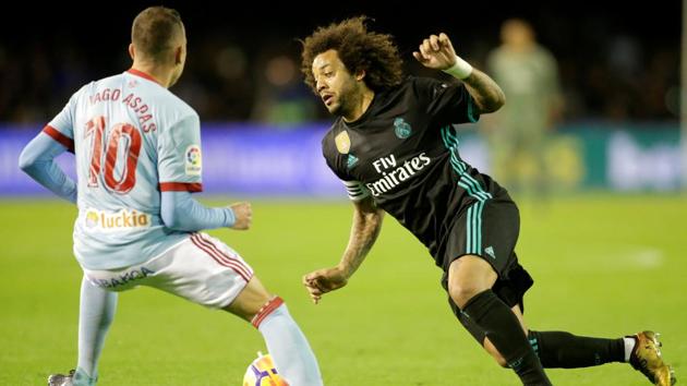 Real Madrid’s Marcelo in action with Celta Vigo’s Iago Aspas in the La Liga on Sunday (Reuters) Real Madrid’s Marcelo in action with Celta Vigo’s Iago Aspas in the La Liga on Sunday (Reuters)
