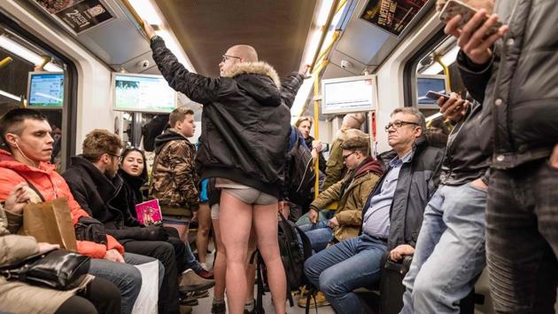 People ride a subway train without pants during international No Pants Ride Day in Warsaw, Poland. Similarly, Russia’s first No Pants Day organised in Moscow in 2016 brought investigations on charges of instigating mass public disorder. (Woitek Radwanski / AFP) 
