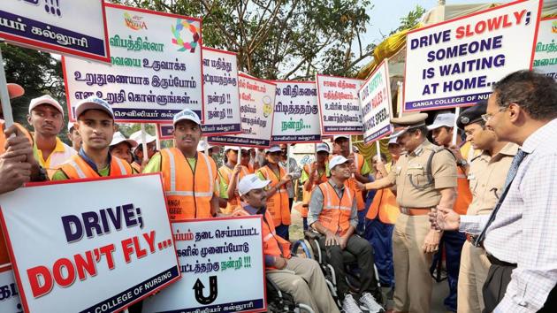 Commissioner K. Periaiah interacts with the public during the inauguration of a road safety awareness program as part of Kovai Festival Celebration in Coimbatore. (PTI)