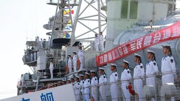 Chinese People’s Liberation Army navy soldiers stand on a decommissioned destroyer in an aircraft carrier theme park on China’s Navy Day in Tianjin last April. (Reuters File Photo) Chinese People’s Liberation Army navy soldiers stand on a decommissioned destroyer in an aircraft carrier theme park on China’s Navy Day in Tianjin last April. (Reuters File Photo)