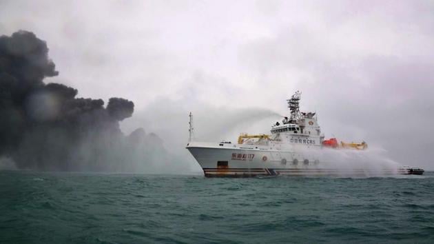 This handout from the Transport Ministry of China shows the Chinese firefighting vessel spraying water on the burning oil tanker Sanchi at sea off the coast of eastern China. (AFP Photo) This handout from the Transport Ministry of China shows the Chinese firefighting vessel spraying water on the burning oil tanker Sanchi at sea off the coast of eastern China. (AFP Photo)