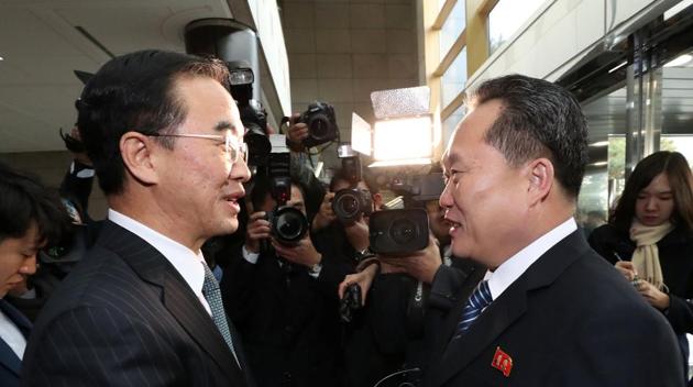 Head of the North Korean delegation Ri Son Gwon shakes hands with his South Korean counterpart Cho Myoung-gyon before their meeting at the truce village of Panmunjom in the demilitarised zone separating the two Koreas. (Reuters Photo) Head of the North Korean delegation Ri Son Gwon shakes hands with his South Korean counterpart Cho Myoung-gyon before their meeting at the truce village of Panmunjom in the demilitarised zone separating the two Koreas. (Reuters Photo)