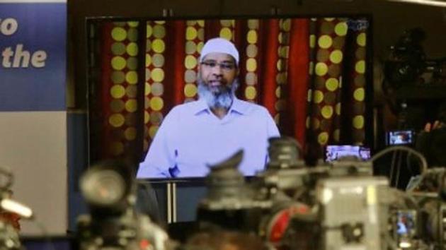 Zakir Naik, an Islamic preacher and founder of Islamic Research Foundation, speaks to the media via a video conference in Mumbai, July 15, 2016. (Reuters) Zakir Naik, an Islamic preacher and founder of Islamic Research Foundation, speaks to the media via a video conference in Mumbai, July 15, 2016. (Reuters)