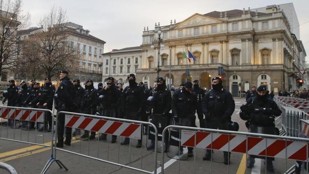 Police officers patrol the area in front of La Scala opera house in Milan, Italy.(AP File Photo)