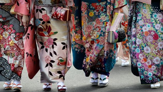 Nearly all young women wear elaborate kimonos or furisode, a long-sleeved kimono for unmarried young women, on this day. Kimono rentals also exist specific to this occasion since the actual cost of such attire can run into thousands of dollars. (Kim Kyung-Hoon / REUTERS) Nearly all young women wear elaborate kimonos or furisode, a long-sleeved kimono for unmarried young women, on this day. Kimono rentals also exist specific to this occasion since the actual cost of such attire can run into thousands of dollars. (Kim Kyung-Hoon / REUTERS)